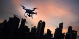 drone over a night skyline