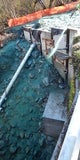 AGI’s subcontractor spraying bonded fiber matrix (erosion control seeding) 