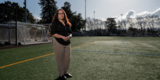 Supervisor Noelia Corzo stands on the field at MLK Center in San Mateo