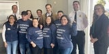 Supervisor Mueller with farmworkers
