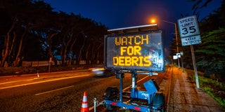 Watch for Debris Street Sign