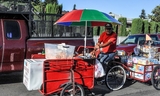 Merchant on bike