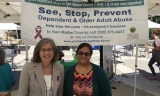 Lisa Mancini, left, Director of San Mateo County Aging and Adult Services, and Nicole Fernandez, Training and Outreach Specialist for EDAPT, raise awareness about elder abuse.