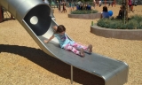 Children enjoy a new slide and other amenities at Beresford Park paid for in part with Measure K funds.