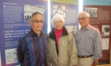 Doug Yamamoto, left, Karyl Matsumoto and Steve Okamoto at the current display at the San Bruno BART station.