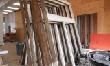 These hand-made original window frames will be refreshed before being reinstalled.
