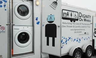 Side shot of the Dignity on Wheels shower and laundry truck.