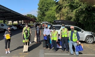 Volunteers and County workers hit the street in East Palo Alto to spread the word about vaccine opportunities.
