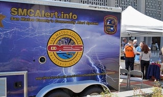 Truck with SMCAlert.info info on its side