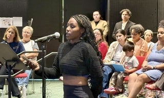woman speaking at mic