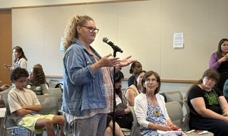 woman at microphone