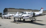 Two Beechcraft airplanes