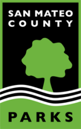 Logo with green border, a wave, a tree and the words San Mateo County Parks