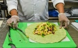 man making a burrito