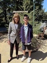 woman and boy in park