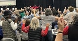 large group of people dancing