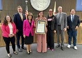 Board members presenting proclamation