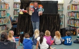 Puppet shows and performances help engage young learners.