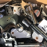 Firearms exchanged for cash at a recent gun buyback