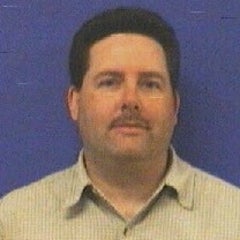 profile image of male with mustache and dark hair