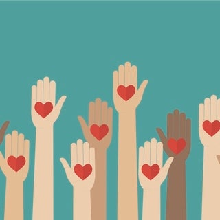 Raised hands with hearts in palms